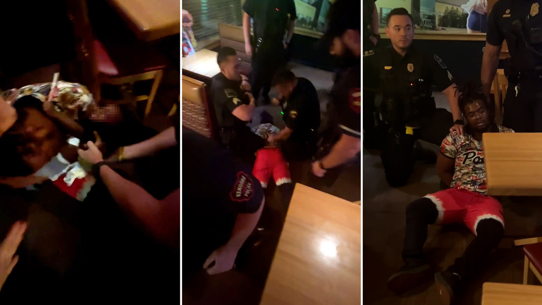Policías arrestan violentamente a un hombre con un bebé en brazos tras confundirlo con un sospechoso